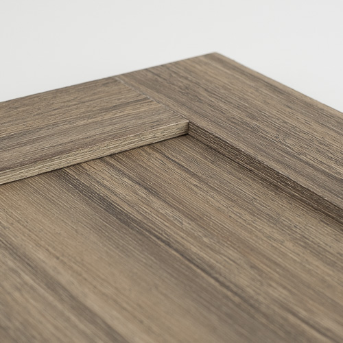 weathered chestnut laminate cabinet door inside corner detail