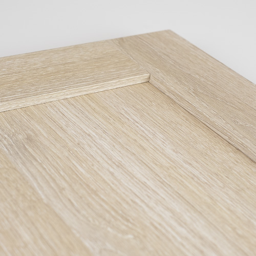 milky oak laminate cabinet door inside corner detail